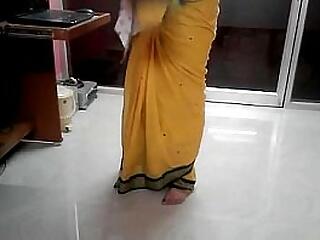 Desi tamil Devoted to aunty exposing navel in all